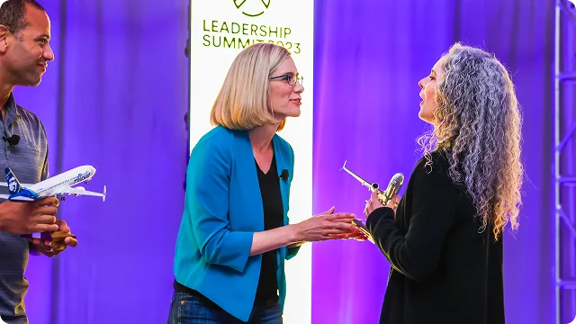Amber Simonsen speaking on stage